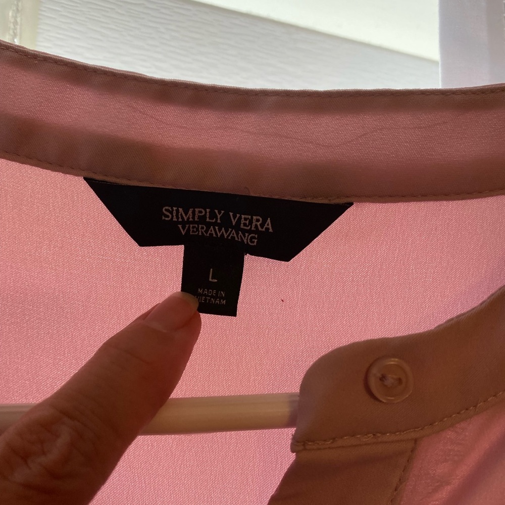 Blush color dress shirt.